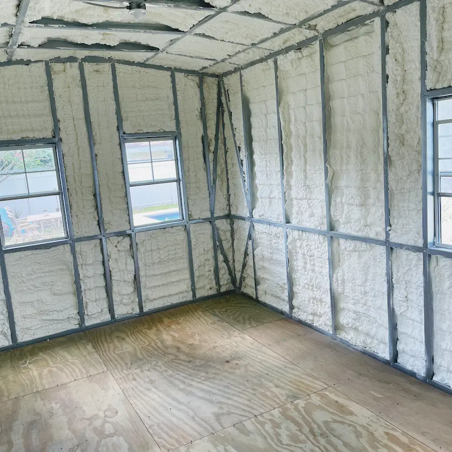Closed-cell spray foam insulation applied to wall cavities in a residential project in Rathdrum